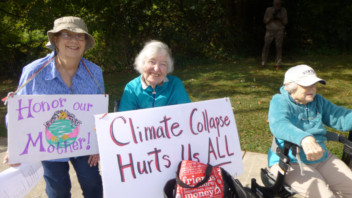 Seniors stand (and sit) in solidarity with millions who spoke out during #ClimateStrike