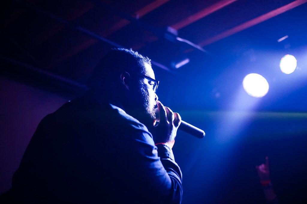 Man singing into microphone