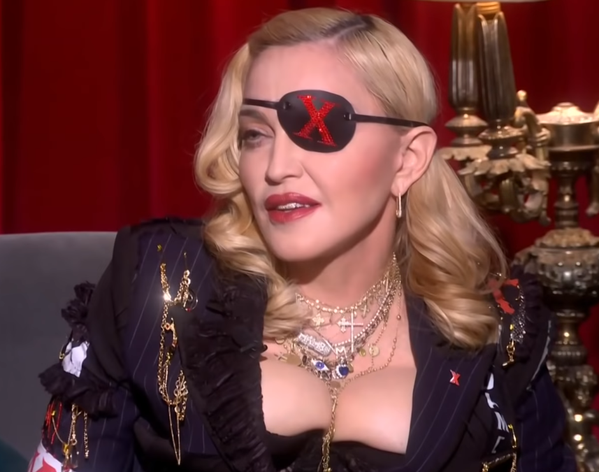 Madonna giving an interview before her show at the Met