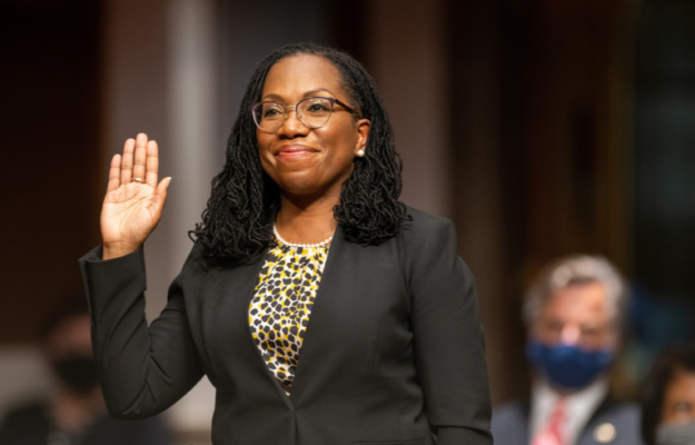 The former federal public defender raising her hand as she gets sworn into proviiding testimony before the Senate Judiciary Committee.