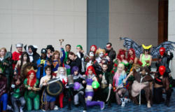 A group of people in costume pose for a photo