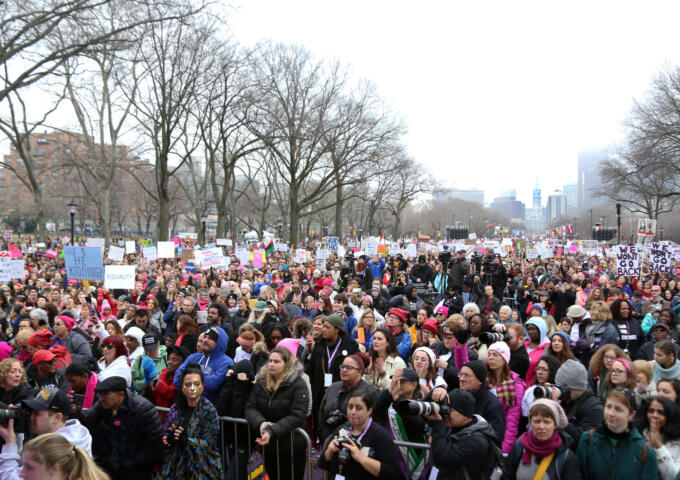 Thousands of protesters standing on the Ben Franklin Parkway holding signs some of which defend abortion.