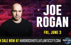 Joe Rogan standing in front of a brick wall. The picture includes graphic writing that reads, "Joe Rogan, Friday, June 3, on sale now at hardrockhotelatlanticcity.com"