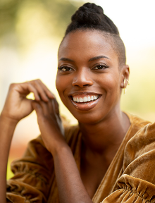 Sasheer Zamata smiles in a headashot.