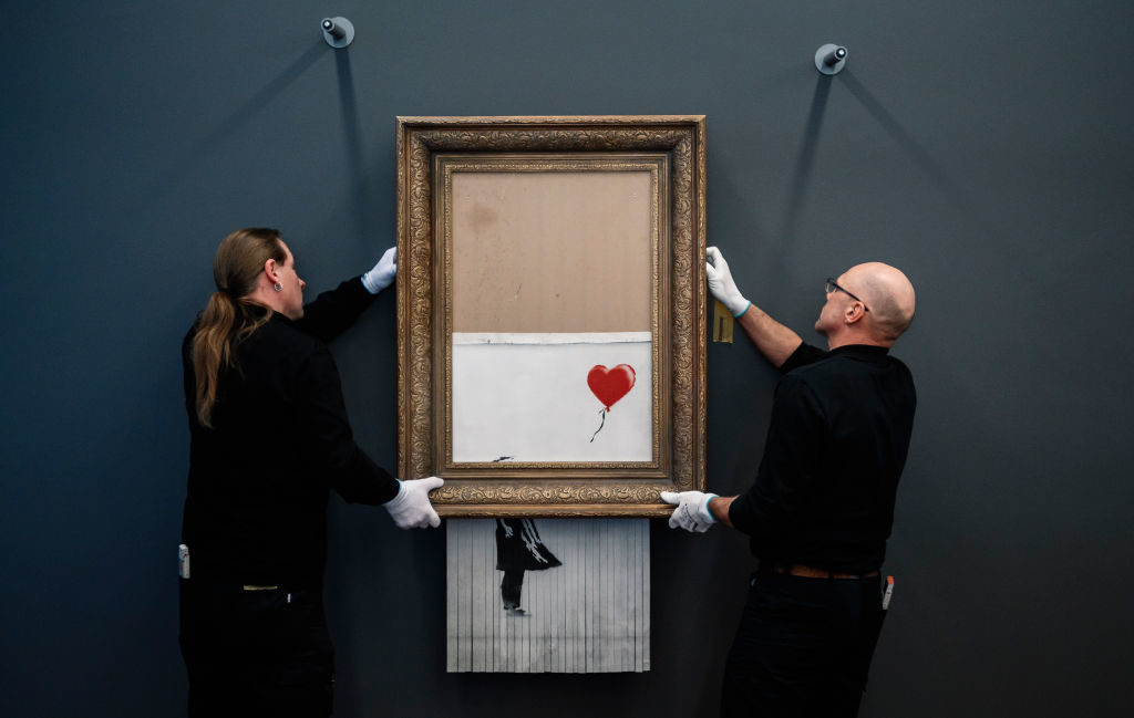 shredded banksy painting