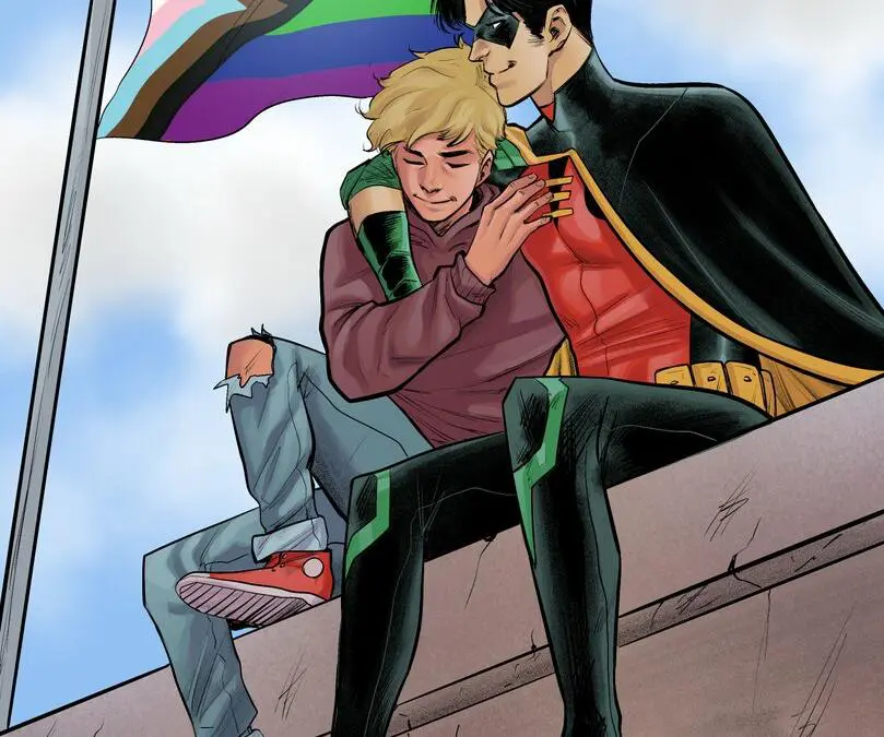 robin and a pride flag